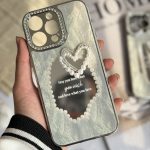قاب موبایل آیفون قلب رمانتیک آیینه ای نگین دار + بندست